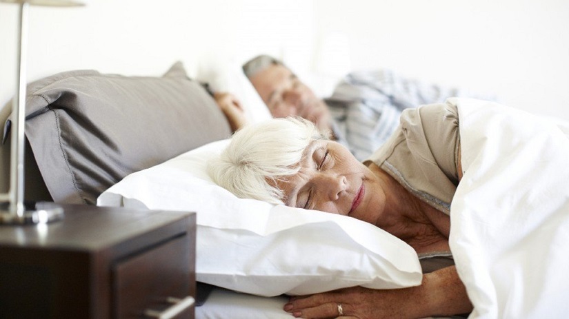 Senior-woman-sleeping-in-bed
